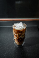 iced coffee put on black background