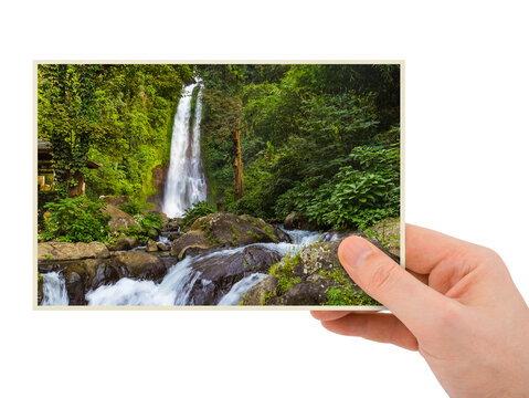Hand and Gitgit Waterfall in Bali Indonesia (my photo)