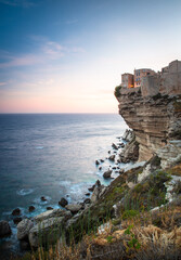 Sunset over the Old Town of Bonifacio, the limestone cliff, South Coast of Corsica Island, France