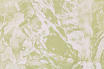 Background of green decorative plaster on the building