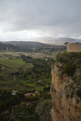Fototapeta na wymiar Cliff with Lookout Point and Panorama of Andalusian Landscape in Ronda, Spain