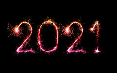 2021 happy new year fireworks written sparklers at night
