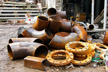 Rusty pipes. Industrial metal waste.