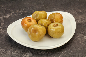 Pickled green tomato in the bowl