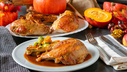 roasted turkey leg with gravy and vegetables