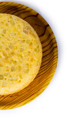 Spanish omelette on a wooden tray on white background