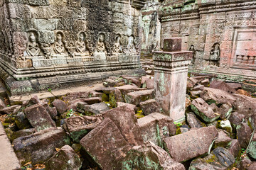 row of hermits at the facades of a chapel in a courtyard in Preah Khan temple,  Angkor Thom, Siem Reap, Cambodia