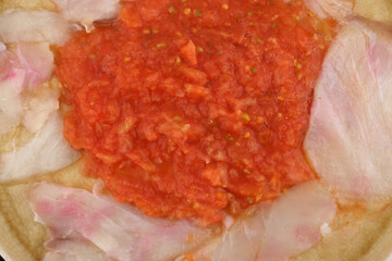 cod carpaccio with tomato and olive oil