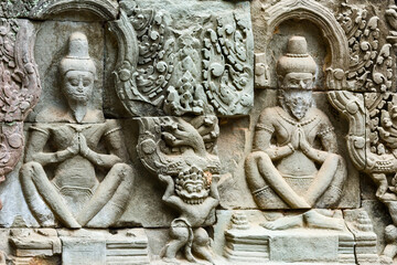 row of hermits at the facades of a chapel in a courtyard in Preah Khan temple,  Angkor Thom, Siem Reap, Cambodia