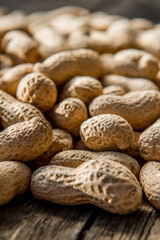 Dried peanuts closeup photo. Peanut in the shell. Food background of peanuts, healthy vegan food
