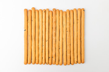 Sesame sticks on white background