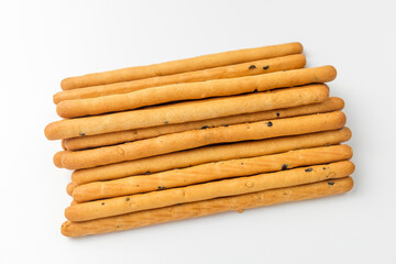 Sesame sticks on white background