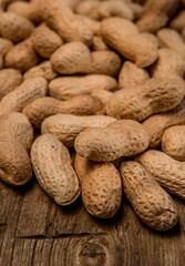 Dried peanuts closeup photo. Peanut in the shell. Food background of peanuts, healthy vegan food