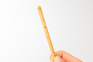 Sesame sticks on white background