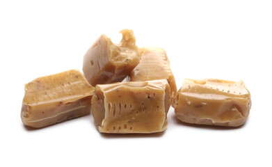 Caramel candies isolated on white background