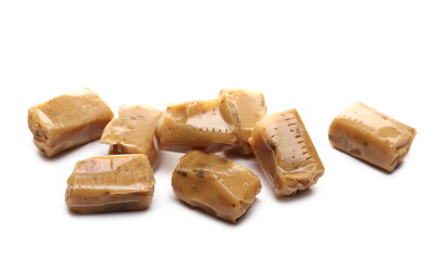 Caramel candies isolated on white background
