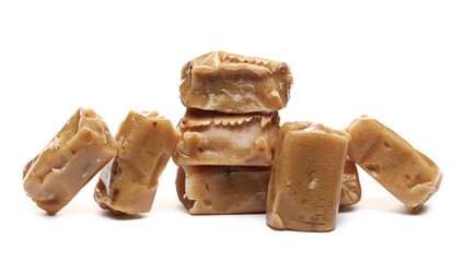 Caramel candies isolated on white background