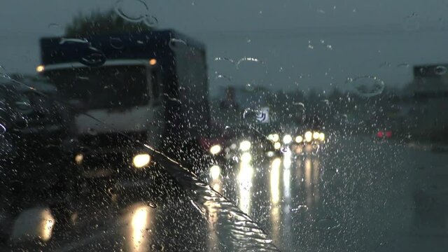 The screen of the smart phone with the navigator shows the traffic jam. Google maps on the smartphone screen in the car. 