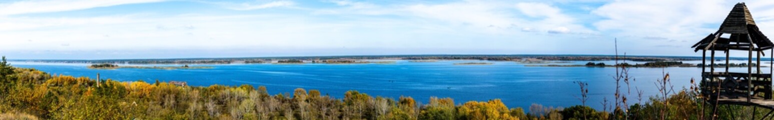 Panorama of Dnieper river with abandoned garden house near Stayky, Kyiv district, autumn