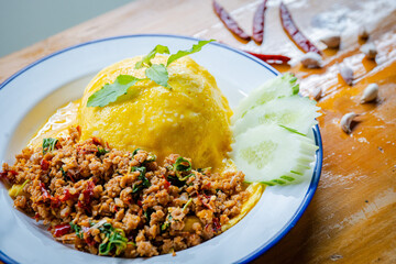 rice and yellow egg with pork basil