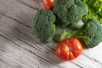 Vegetable still life with broccoli, tomatoes and salad