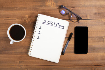 New Year's Solution Goal List 2021. Handwritten notebook about New Year's goals and resolutions plan list.