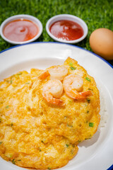 yellow fried egg with sauce