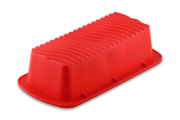 Red silicone muffin form isolated on white background. Cake cup, silicone mold, bakeware.