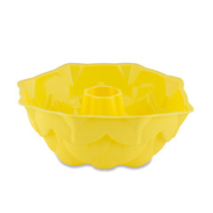 Yellow silicone muffin form isolated on white background. Cake cup, silicone mold, bakeware.