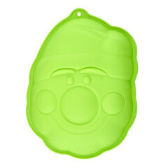 Green silicone cupcake or muffin form isolated on white background. Cake cup, silicone mold, bakeware. Top view, flat lay