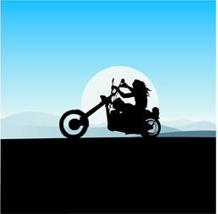 motociclista al tramonto