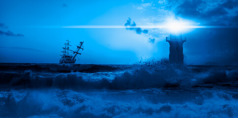 Sailing old ship in storm sea with lighthouse