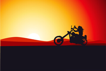 Obraz na płótnie Canvas motociclista al tramonto