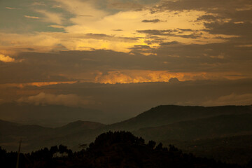 the view of the mountains and the beautiful twilight sky with the texture of the clouds forming a texture
