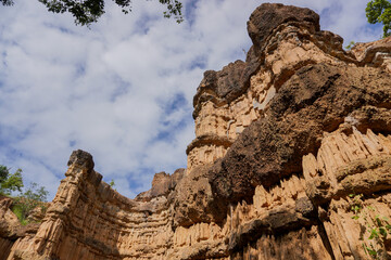 Look up shot Landscape corroded ancient natural curve cliff mountain from the rain up in the hill,...