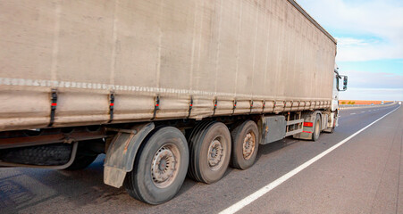 Truck on the asphalt road - Commercial cargo delivery truck