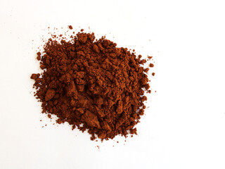 Ground coffee isolated on white background