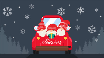 Dwarf gnomes wearing red hats hold gifts in the trunk To go to celebrate Christmas in winter when snowflakes are falling