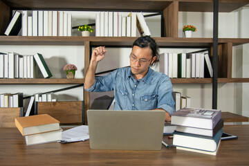 Asian man prepare to write something