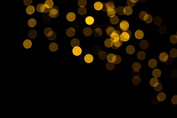 The golden side's or boke on a black background. Merry Christmas and happy New Year. Christmas background.