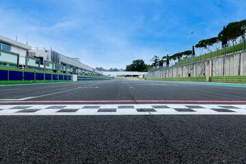 Motor sport circuit asphalt track starting line checkered sign front view