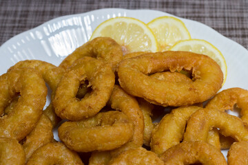 Plate of breaded squid rings. Roman-style squid rings