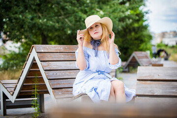 Obraz premium blonde in a blue dress