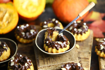 Selective focus. Macro. Delicious pumpkin cakes. Beautiful autumn dessert. A healthy pumpkin dessert.