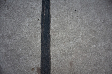 High quality texture of asphalt with black stripe. P.S. Cigarettes and gums are not included! (300dpi, 6000x4000)
