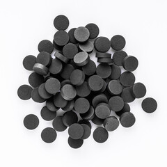 activated carbon on a white acrylic background