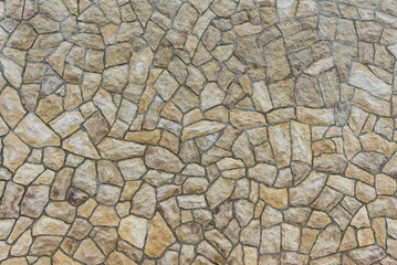 A background, a stone wall with irregular joints. - obrazy, fototapety, plakaty
