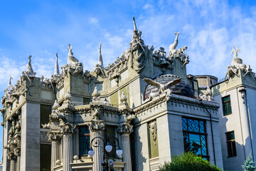 Fototapeta na wymiar House with chimeras in Kiev, Ukraine. Art Nouveau building with sculptures of the mythical animals was created by architect Vladislav Gorodetsky between 1901 and 1903.