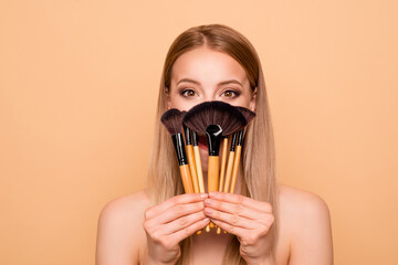 Portrait of dream dreamy cunning curious youth person hold hand blusher have style feel positive cheerful satisfied candid content excited she isolated on beige background