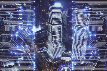 Double exposure of technology theme hologram and cityscape background. Concept of Hightech.